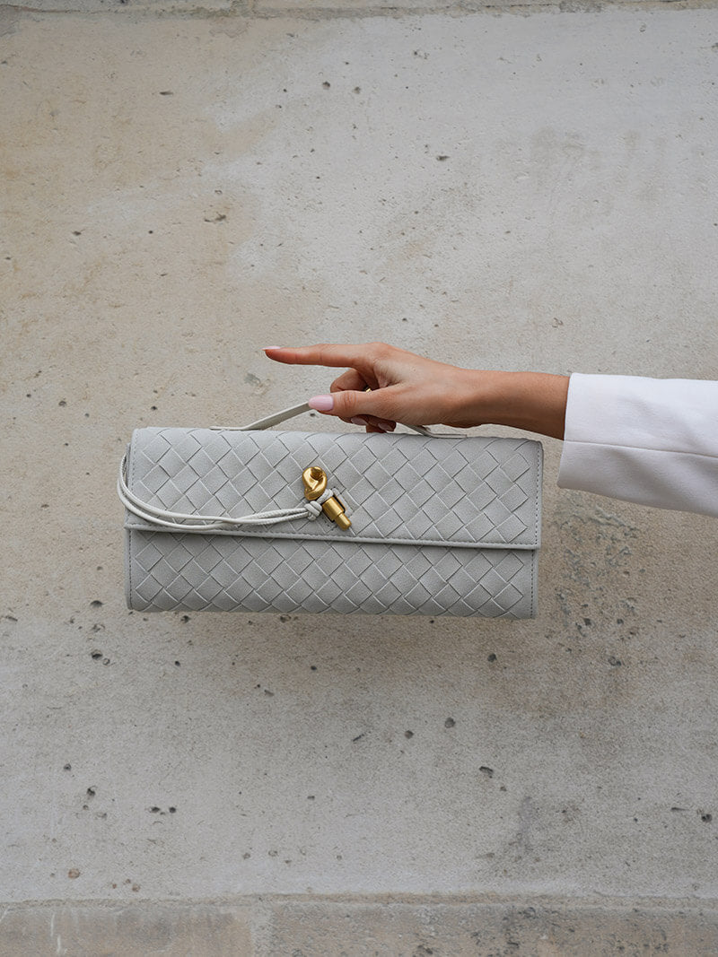 LEANDRA WOVEN CLUTCH